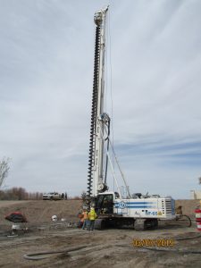 Continuous flight auger method used for 45'-60' deep drilled piers at end walls of sediment basins as part of the Thurman I & II Arroyo project in 2019